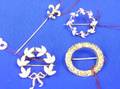 Three Circle Pins and a FleurdeLis Pin