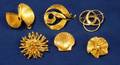 Six Modern Gold Brooches