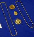 Three Gold Pendants and Two Gold Chains