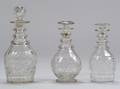 Three Colorless Freeblown Leaded Cut Glass Decanters