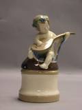 European Ceramic Child on Beetle Figural