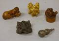 Two Japanese Carved Wood Netsukes and a Carved Ivory Netsuke a Small Silver Gourdform Netsuke and a Small Cast Bronze Mask