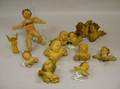Nine Plaster and Wood Cherub Ornaments
