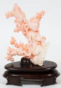 CHINESE CARVED CORAL FIGURE OF GUANYIN