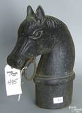 Iron hitching post in the form of a horse head
