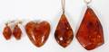 AMBER PENDANTS AND EARRINGS FOUR PIECES