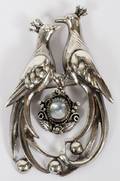 STERLING  MOONSTONE FIGURAL BROOCH