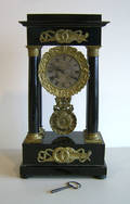 French ebonized and ormolu mantle clock 19th c