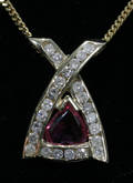 120094 RUBY AND DIAMOND PENDANT SET IN 14 KT GOLD WIT