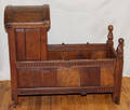 0127 ENGLISH TUDOR STYLE OAK CRADLE CIRCA 1900 H 33