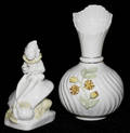 021251 BELLEEK PORCELAIN FIGURE OF A GNOME  A VASE H