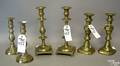 Three pairs of Victorian brass candlesticks
