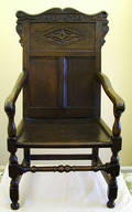 2253 ANTIQUE EUROPEAN OAK HALL CHAIR DATED 1702