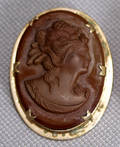 011387 CARVED SARDONYX CAMEO IN A GOLDFILLED SETTING
