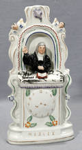 121392 STAFFORDSHIRE POTTERY JOHN WESLEY WITH CLOCK