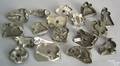 Seventeen tin cookie cutters