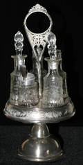 011452 VICTORIAN SILVERPLATE  GLASS CRUET STAND LATE