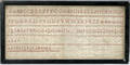 010341 SAMPLER WITH EMBROIDERED ALPHABET FRAMED 19 T
