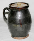 0500 CROCKERY COVERED PITCHER H 7 DIA 5