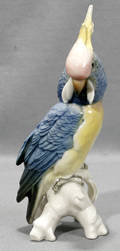 021627 GERMAN HANDDECORATED PORCELAIN FIGURE OF A PAR