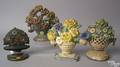 Four cast iron flower bouquet door stops