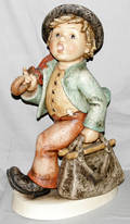 072107 HUMMEL BISQUE FIGURE THE MERRY WANDERER