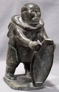 052109 INUIT SOAPSTONE CARVING W KAYAK
