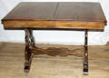 042240 N EUROPEAN STYLE CARVED OAK TRESTLE BASE TABLE