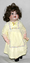 061346 SIMON  HALBIG GIRL DOLL W YELLOW DRESS