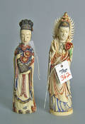 Two painted and carved ivory figures of women