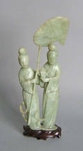 Jade pale green figural group with women and fan