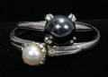 030384 PEARL AND STERLING SILVER RINGS 2 PCS