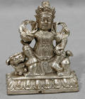 052475 CHINESE PEWTER WARRIOR SEATED ON A FOO DOG