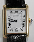 072042 CARTIER GOLD MANS WRISTWATCH