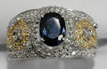 050027 GOLD 064 CT DIAMOND  144 CT SAPPHIRE RING