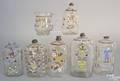 Six Steigel type blown clear glass bottles late 18th c