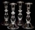 STEUBEN GLASS BALUSTER CANDLESTICKS SET OF FOUR