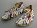 Pair of Plains beaded hide moccasins 19th c