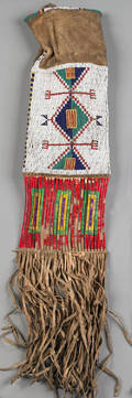 Plains beaded and fringed hide tobacco bag 19th c probably Sioux