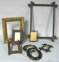 Eight assorted frames to include a pair of oval frames and an inlaid frame