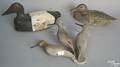 Five wooden decoys to include one with redhead and 3 shore birds