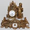 FRENCH GILT METAL FIGURAL CLOCK