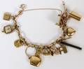 14KT YELLOW GOLD CHARM BRACELET