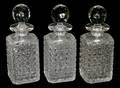 ANTIQUE HAND CUT GLASS DECANTERS THREE