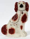STAFFORDSHIRE SEATED KING CHARLES SPANIEL 19TH C