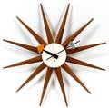 HOWARD MILLER TEAKWOOD AND PAINTED METAL WALL CLOCK