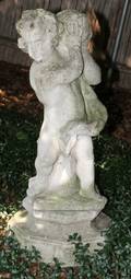 CARVED STONE FIGURAL GARDEN SCULPTURE