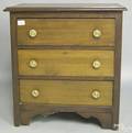 Diminutive pine chest of drawers