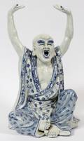 PORCELAIN ORIENTAL FIGURE OF A PRIESTLOHAN