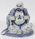 PORCELAIN ORIENTAL FIGURE OF A PRIESTLOHAN
